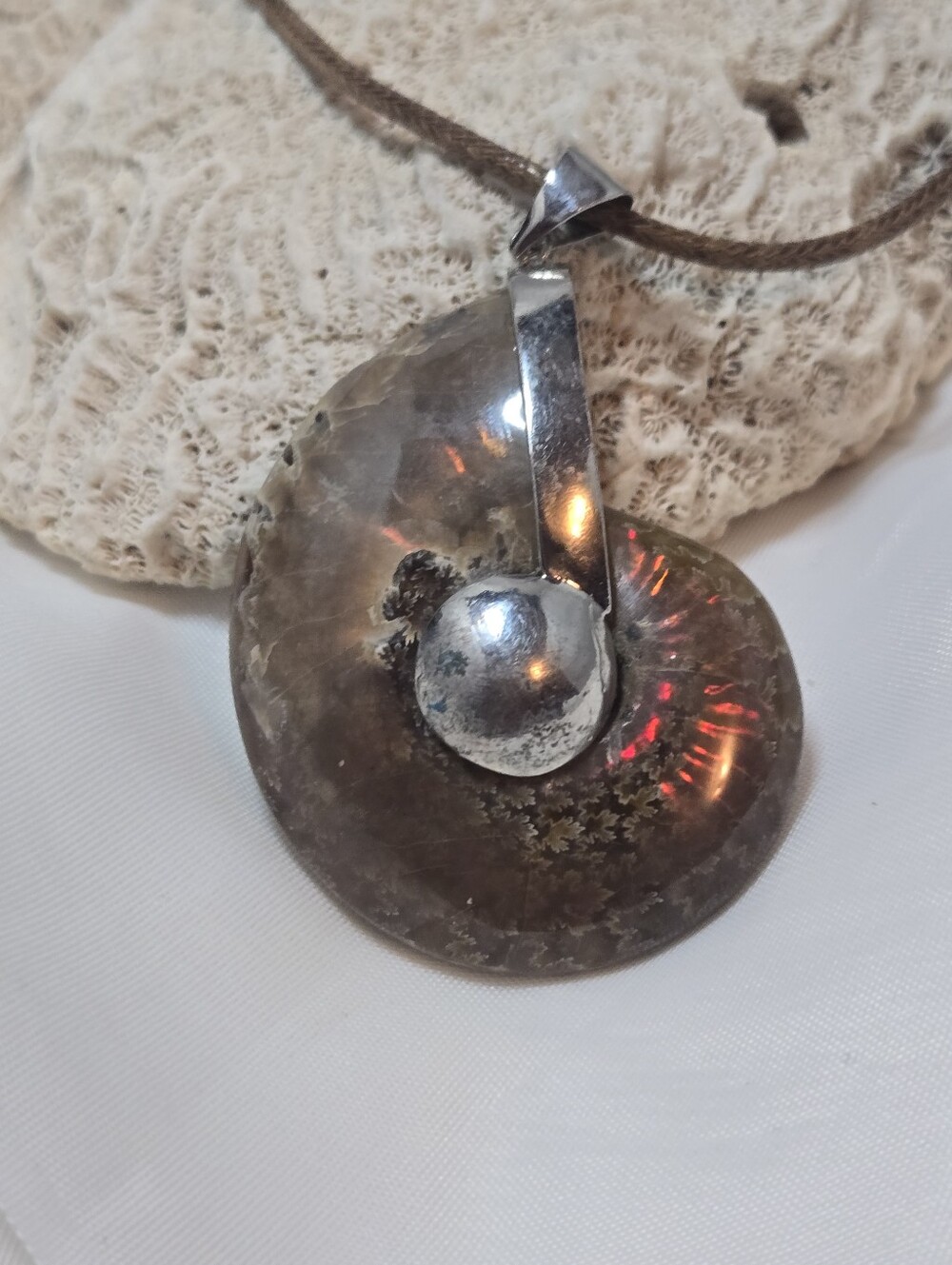 Earth Art hand crafted artisan Ammonite Pendant in Brown with Silver Accent